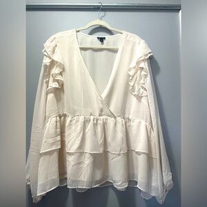 Brand new cream ruffled sleeve